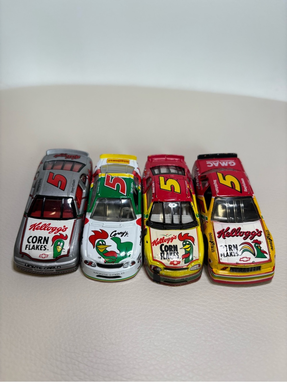 Vintage 1990s Kellogg’s Corn Flakes NASCAR diecast stock cars in 1:24 scale